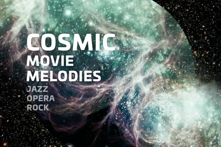 Bläulich schimmernde Galaxie vor Sternenhintergrund.
