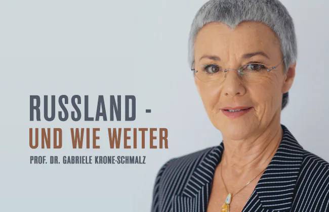 RUSSLAND - UND WIE WEITER – Russland - und wie weiter. Prof. Dr. Gabriele Krone-Schmalz. Frau mit grauem Haar, Brille, gestreifter Jacke, Halskette.