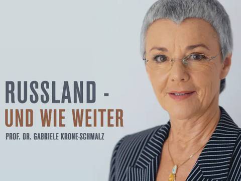 RUSSLAND - UND WIE WEITER – Russland - und wie weiter. Prof. Dr. Gabriele Krone-Schmalz. Frau mit grauem Haar, Brille, gestreifter Jacke, Halskette.