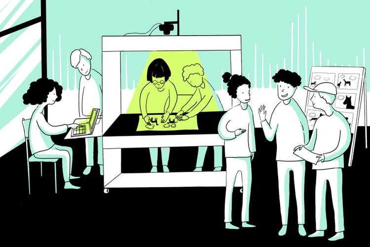 Illustration: Gitte Hellwig – Auf einer Illustration in den Farben Rot, Gelb, Weiß und Schwarz steht eine Workshop-Gruppe um den Tricktisch.