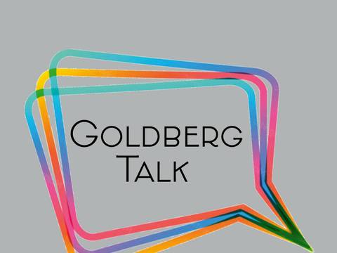  – Mehrfarbige Sprechblase mit dem Text "GOLDBERG TALK" auf grauem Hintergrund.